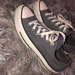 gray chucks with white laces